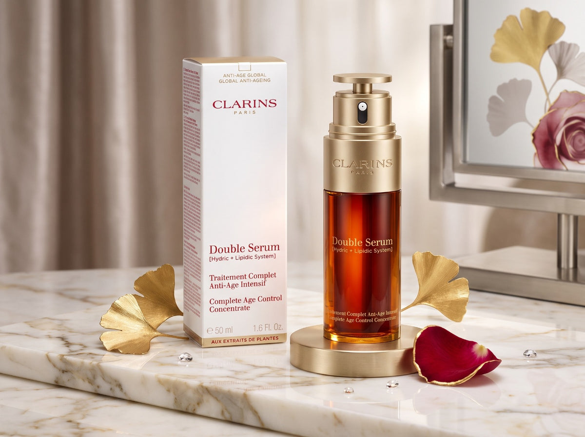 Clarins Double Serum 50ml bottle and box displayed on a luxury marble surface