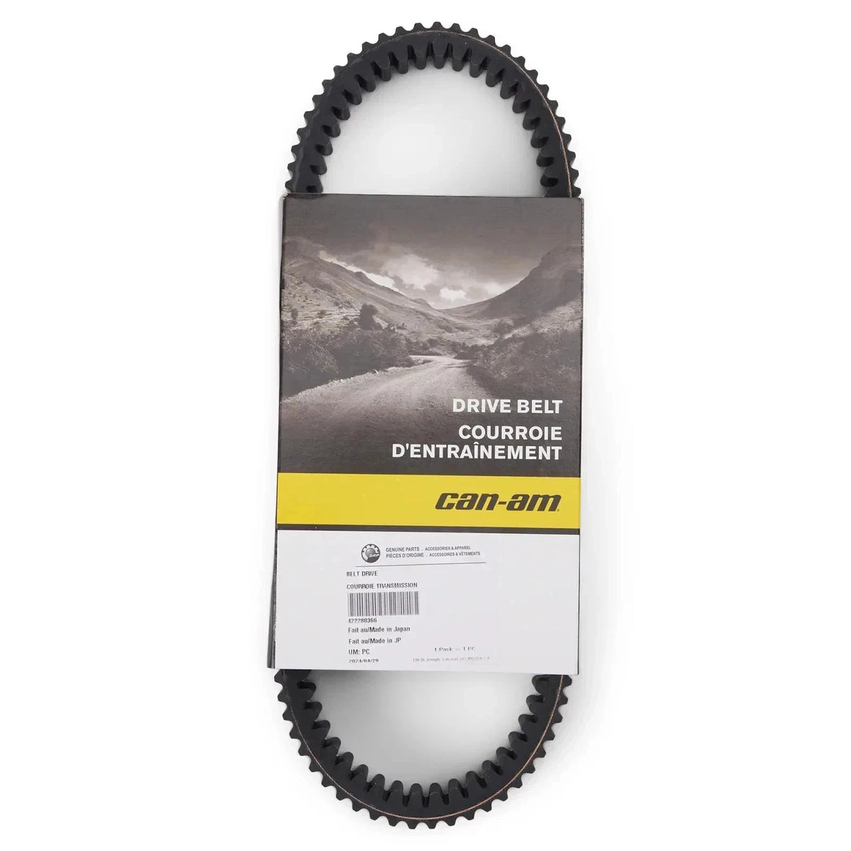 A black rubber drive belt with a toothed edge, wrapped around a cardboard packaging label that reads 'DRIVE BELT COURROIE D'ENTRAINEMENT' and shows the Can-Am brand.