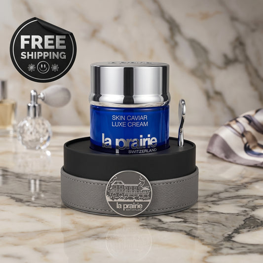 La Prairie Skin Caviar Luxe Cream jar on a marble surface with free shipping badge.