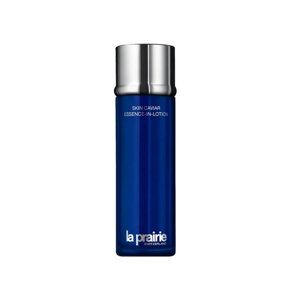 La Prairie Essence-In-Lotion Skin Caviar bottle in deep blue with a reflective silver cap, centered on a plain white background.