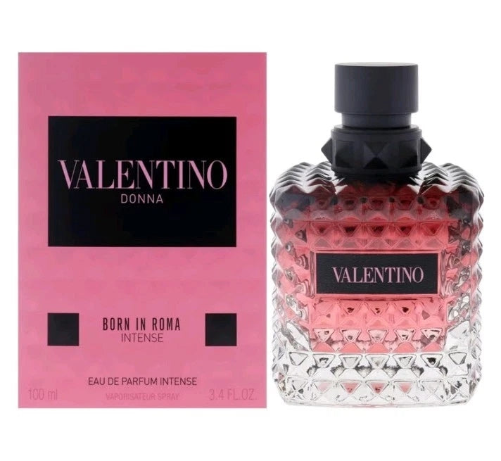 Valentino Donna Born in Roma Intense Eau de Parfum Intense, featuring a textured pink and rose gradient glass bottle next to its pink and black retail box.